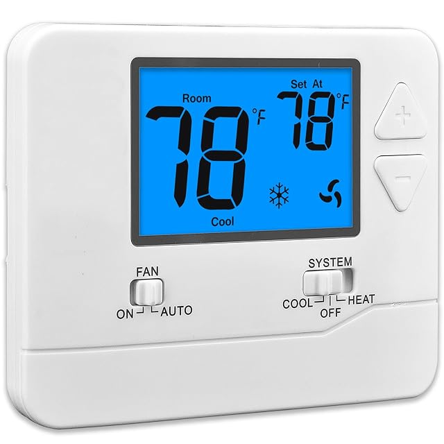 Suuwer non-programmable thermostat with blue backlit display on a wall